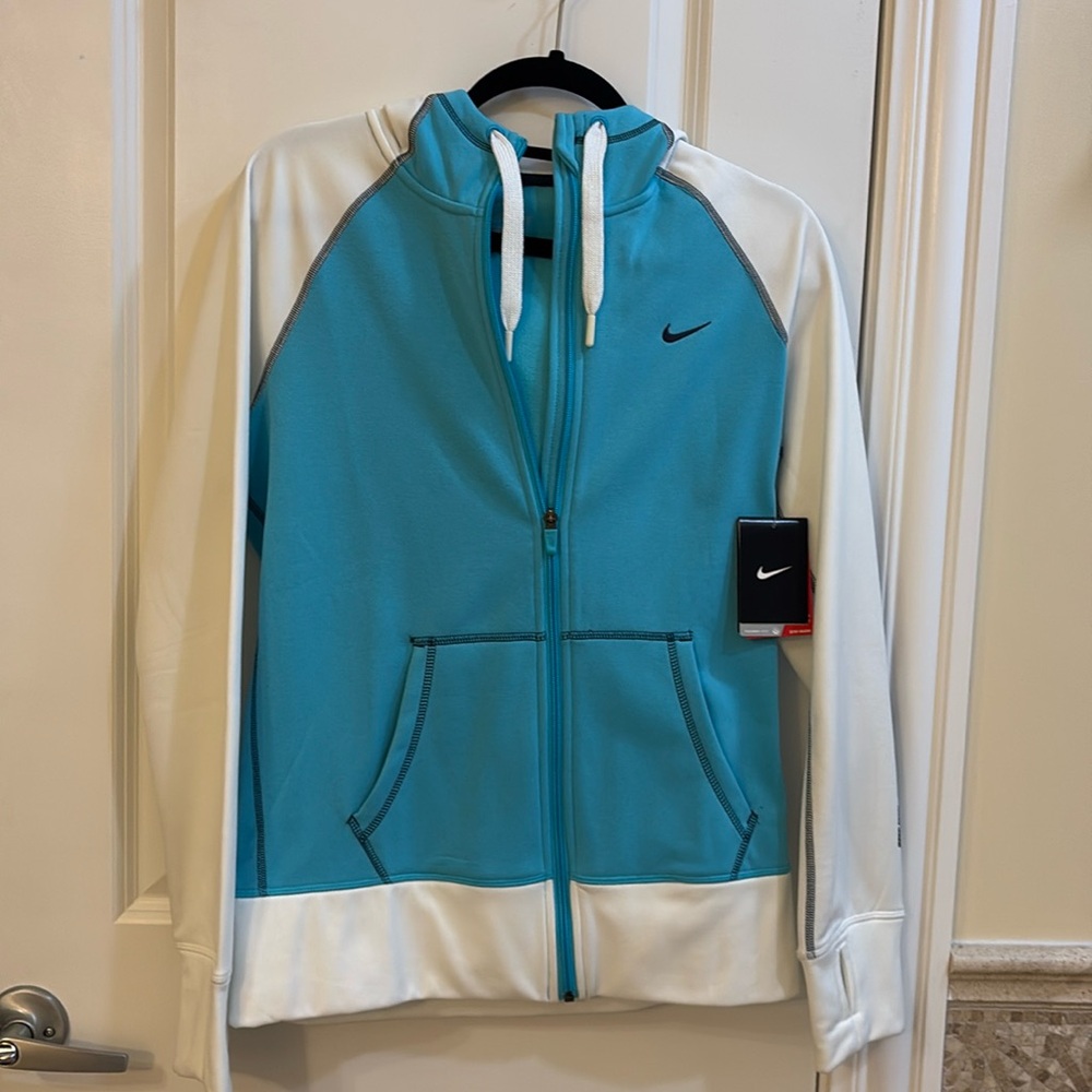 Nike Therma-Fit, zip up jacket.
New with tags/never worn.